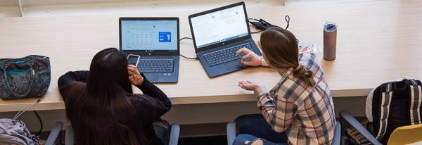 two female students at computer