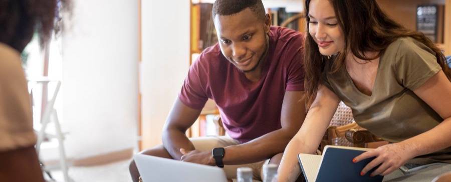 students looking at computer